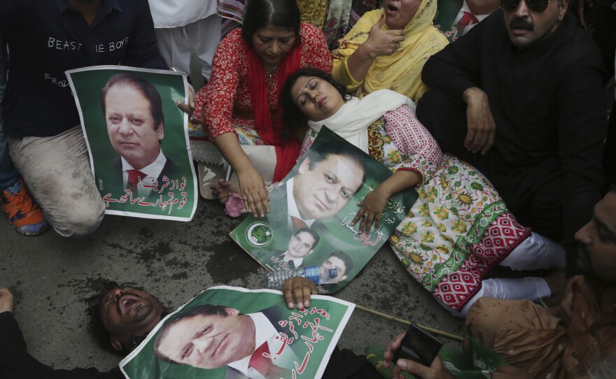 Nawaz Sharif's supporters protested his ouster in Lahore on Friday.