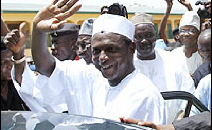 Presidential candidate for the ruling People's Democratic Party (PDP) Umaru Yar'Adua waves to the crowd after casting his vote in Katsina, Nigeria. Yar'Adua was declared winner of the presidential election in Nigeria Monday.