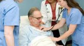 University of San Diego Nursing Students evaluate a mock patient. 
