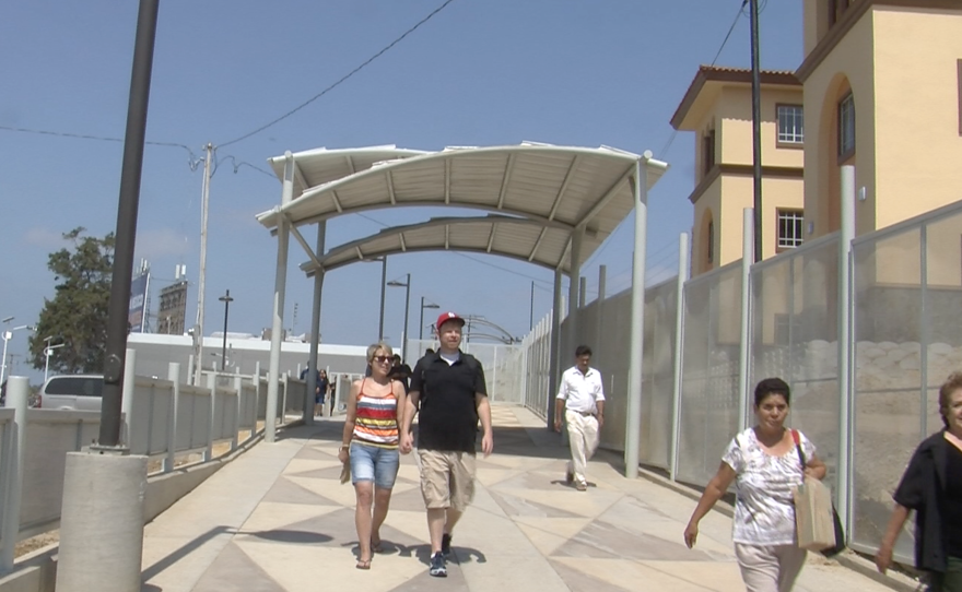 Joel Ewbank and his girlfriend cross the San Diego-Tijuana border after a 20-minute wait at East Gate, Aug. 21, 2015.