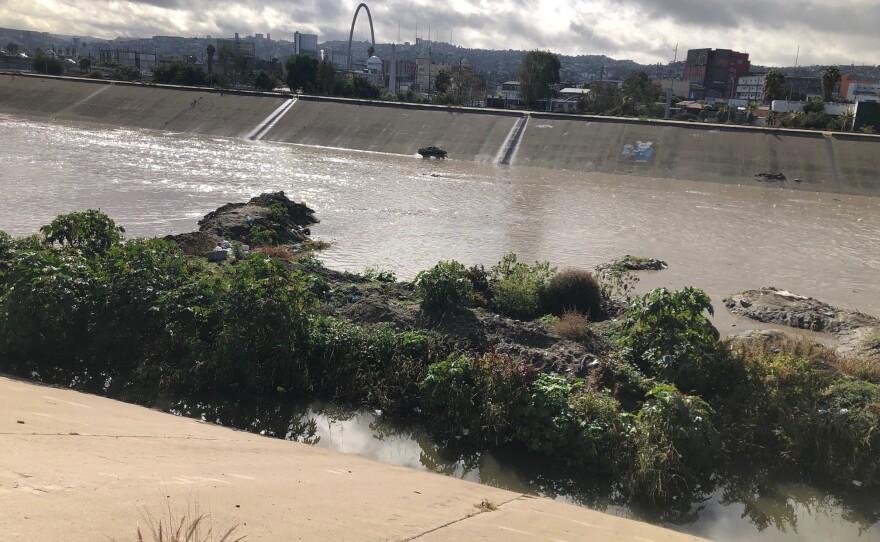 Water flowing through the Tijuana River channel after days of heavy rains on Dec. 12, 2022.