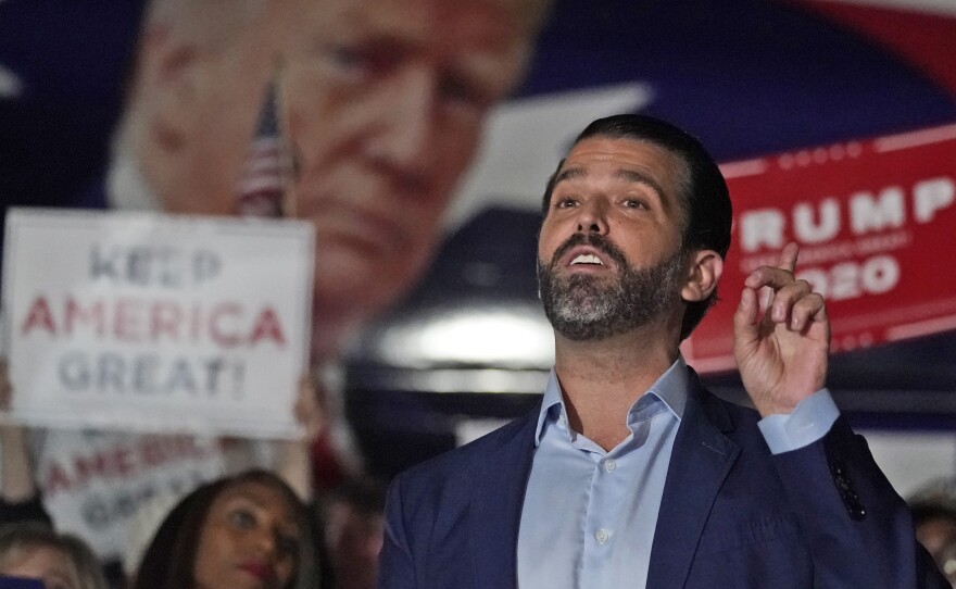 In this Nov. 5 photo, Donald Trump Jr. gestures during a news conference at Georgia Republican Party headquarters in Atlanta. Trump Jr. has been infected with the coronavirus, and says he is currently asymptomatic.