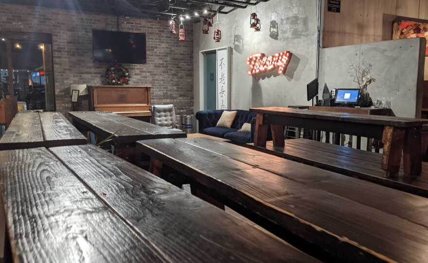 Empty tables inside the restaurant Common Theory in Kearny Mesa. Dec. 6, 2020.