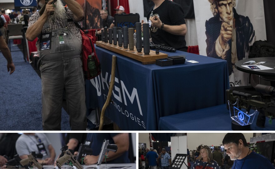 (Top photo) A man points a rifle displayed at the conference. (Bottom left photo) A child looks at guns on exhibit. (Bottom right photo) People look at guns on display.