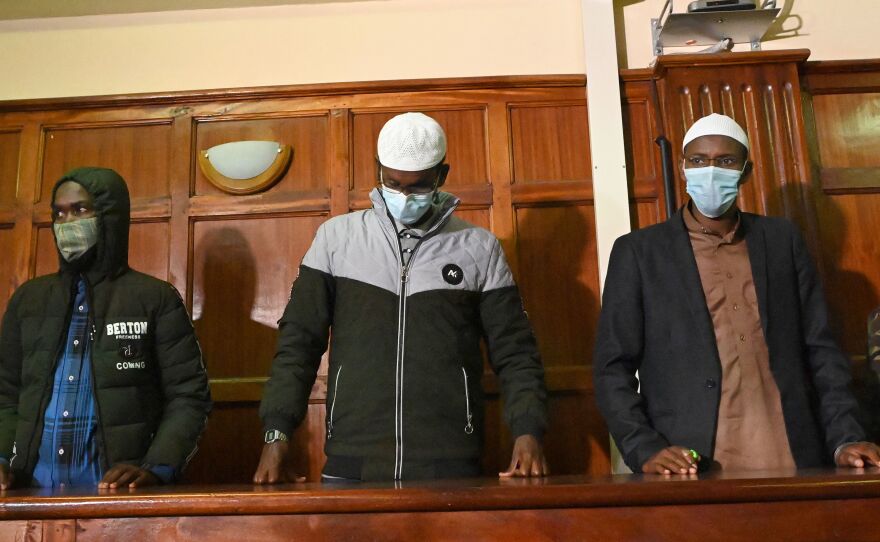 Suspects (left to right) Hassan Hussein Mustafa, Liban Abdullahi Omar, and Mohamed Ahmed Abdi standing in the dock during their appearance for their case at the Milimani court in Nairobi on Wednesday. Abdi and Mustafa were found guilty, while Omar was acquitted of charges.