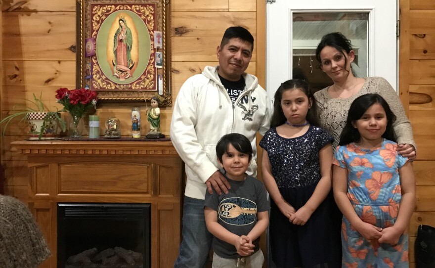 Victor Flores, his fiancé Mary Robbins and their children Manny, Leyla and Miranda. Flores says he has felt some of the backlash against newcomers in Milbridge.