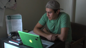 Sitting in his El Centro apartment, combat veteran Ruben Moreno Garcia video chats with his psychologist located at the San Diego VA, July 8, 2013. 