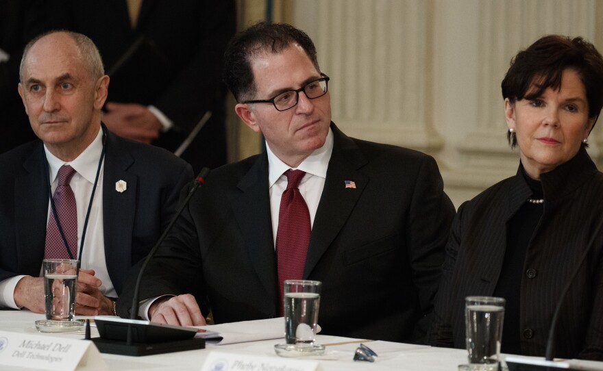 White House Director of Strategic Initiatives Christopher Liddell (from left) with Dell CEO Michael Dell and General Dynamics CEO Phebe Novakovic during a meeting with President Trump on Feb. 23.