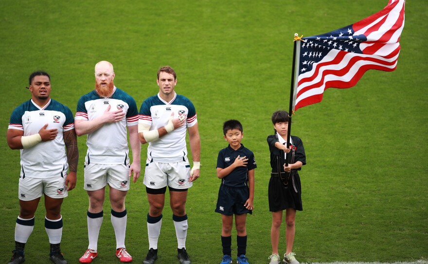 The USA players line up for the national anthem prior to their 2019 Rugby World Cup match against Tonga in Higashiosaka, Japan.