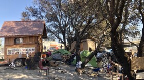 This tent camp is nestled between a freeway, rail tracks and a Burger King near the Fruitvale section of Oakland.