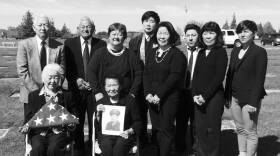 Generations of the Masumoto family gathered in Selma, CA in 2017 for a memorial service. Yoshi Masumoto Yamagiwa (center) is holding a photo of her brother, George Masumoto, who was killed fighting for the U.S. in World War 2, while his family was incarcerated in a prison camp for Japanese Americans in Gila River, Arizona. 