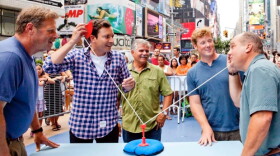 Landscape contractor Roger Cook, special guest Jimmy Fallon, general contractor Tom Silva, ASK THIS OLD HOUSE host Kevin O'Connor and plumbing and heating expert Richard Trethewey in the middle of Times Square, New York.