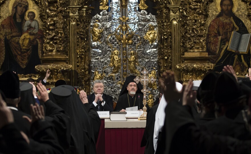 Ukrainian President Petro Poroshenko attends a synod of three Ukrainian Orthodox churches to elect leadership of a new unified church in the St. Sophia Cathedral in Kiev, Ukraine.