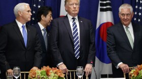 Japanese Prime Minister Shinzo Abe walks to his seat at a luncheon with President Donald Trump and South Korean President Moon Jae-in at the Palace Hotel during the United Nations General Assembly, Thursday, Sept. 21, 2017. 