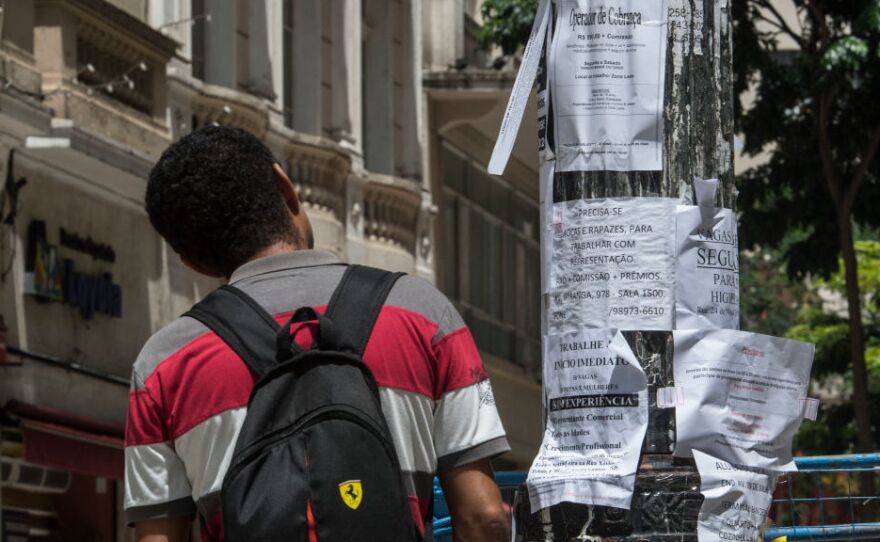 A man reads job advertisements in January 2017, in downtown Sao Paulo. Brazil is facing an unemployment crisis.