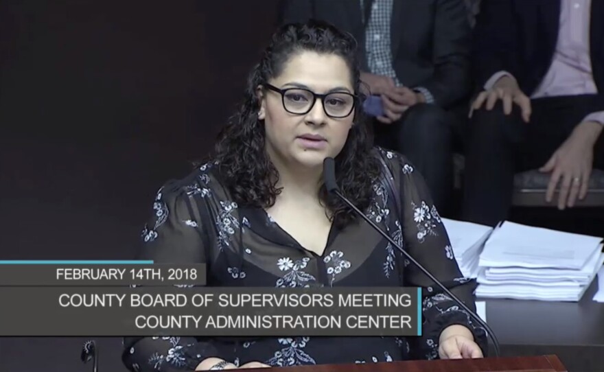 Paola Martinez-Montes, director Alliance of Californians for Community Empowerment’s San Diego office, which is a member of the Invest in San Diego Families coalition, addresses the San Diego County Board of Supervisors, Feb. 14, 2018. 