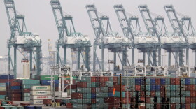 Shipping containers stack up at the Port of Los Angeles.