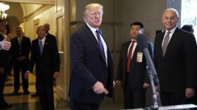 President Donald Trump answers a question from the press about discussion of the tax bill, Thursday, Nov. 16, 2017. 