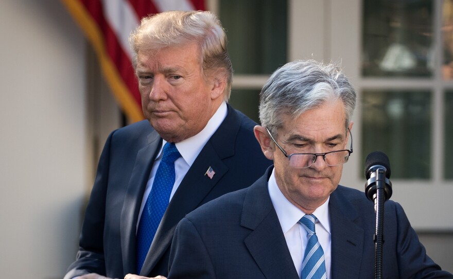 President Trump looks on as his nominee for Federal Reserve chairman, Jerome Powell, speaks at the White House on Nov. 2. On Thursday, Trump said he is "not thrilled" about Fed interest rate hikes.