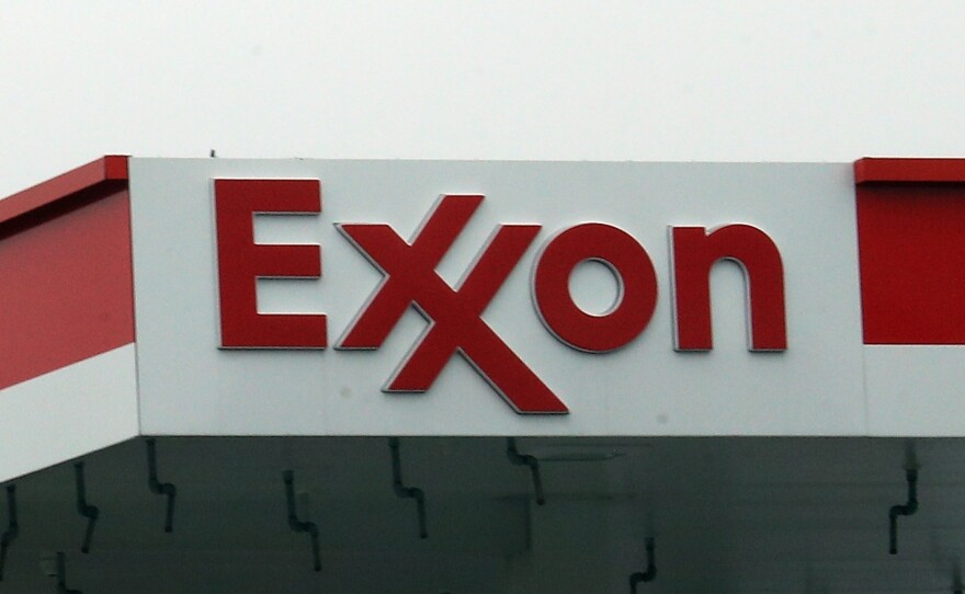 An Exxon station in Hicksville, N.Y., in March. Exxon Mobil Corp. announced up to $20 billion in write-downs of natural gas assets, the biggest such action ever by the company.