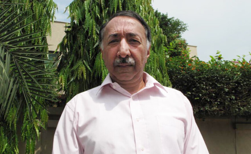 Retired senior police investigator Zafar Qureshi, 59, stands outside his home in Lahore, Pakistan, where security guards are stationed 24 hours a day. The former police official has probed some of the highest profile cases of official misconduct in Pakistan, and says he fears for his safety and that of his children in a country that he says is steeped in a "culture of corruption."