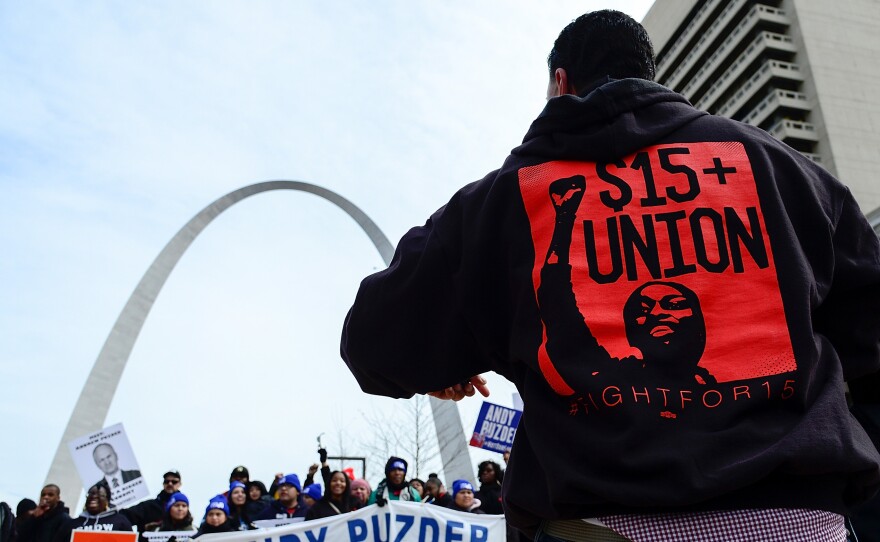 Protesters rally outside of a Hardee's restaurant on Feb. 13, 2017, in St Louis, Mo., in support of raising the minimum wage.