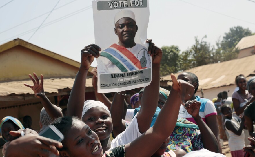 Gambians celebrate the victory of opposition coalition candidate Adama Barrow against longtime President Yahya Jammeh on Friday in the streets of Serrekunda, Gambia.