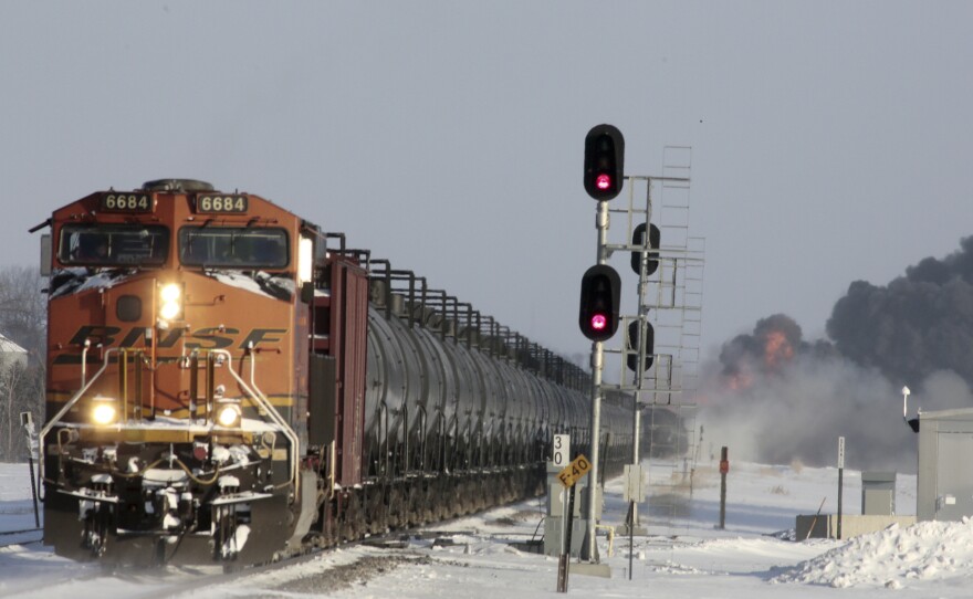 A plume of smoke rises from scene of a derailed train near Casselton, North Dakota, on Monday.