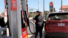 Woman pumps gas at a Circle K gas station in Chula Vista as prices skyrocket across San Diego County, March 5, 2026.