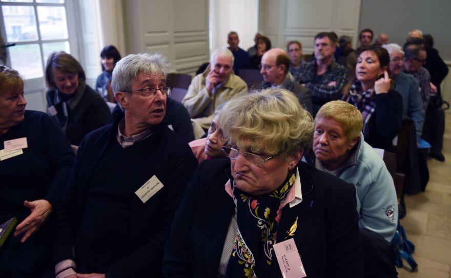 Victims await the start of the trial of Dutch dentist Jacobus Van Nierop on March 8 at the Nevers courthouse in central France. Van Nierop has since been sentenced to eight years behind bars.