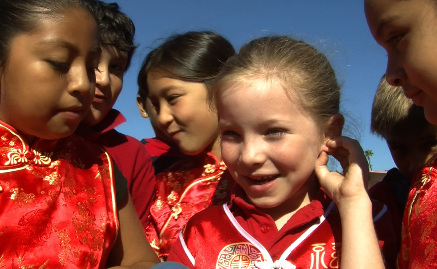 Students at the Barnard Asian Pacific Language Academy gather in costume for a Lunar New Year celebration, Feb. 25, 2015.