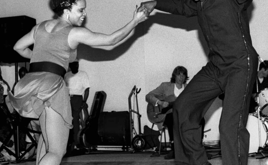 American dancers and choreographers Mickey Davidson (left) and 80-year-old Lindy Hop pioneer Frankie Manning (1914 - 2009) performing at Smithsonian, Madison Building, May 18, 1995.