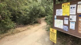 A San Diego County Department of Health Services sign warns hikers of the dangers of ticks, September 2, 2019. 
 
