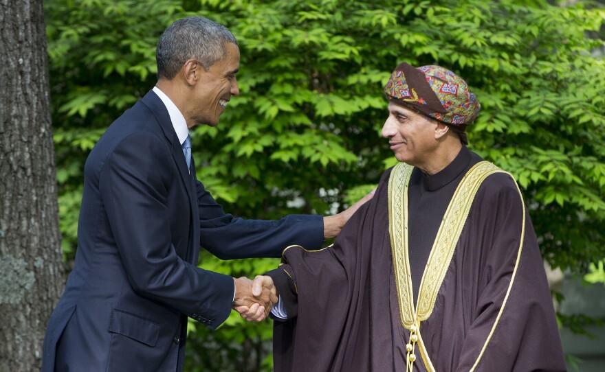 President Obama shakes hands with Oman's Deputy Prime Minister Sayyid Fahad Bin Mahmood Al Said at Camp David, Md., on May 14, 2015. Oman said Monday that it had accepted 10 prisoners being released from Guantanamo Bay in Cuba. That reduces the number of detainees remaining at Guantanamo to 45.