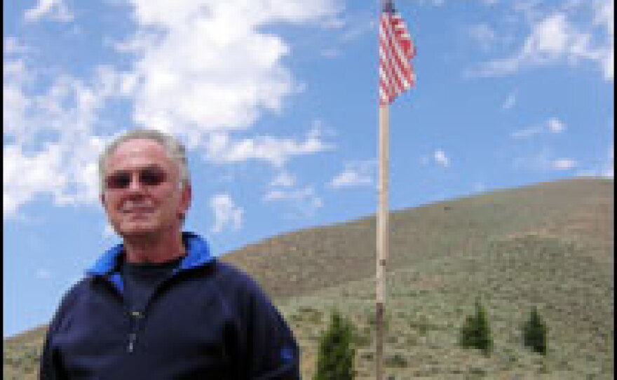 Ed Terrazas of Hailey, Idaho, erected a flag as a protest on the 115 acres he owns, after the county said he could build only two houses on his land instead of the planned four.