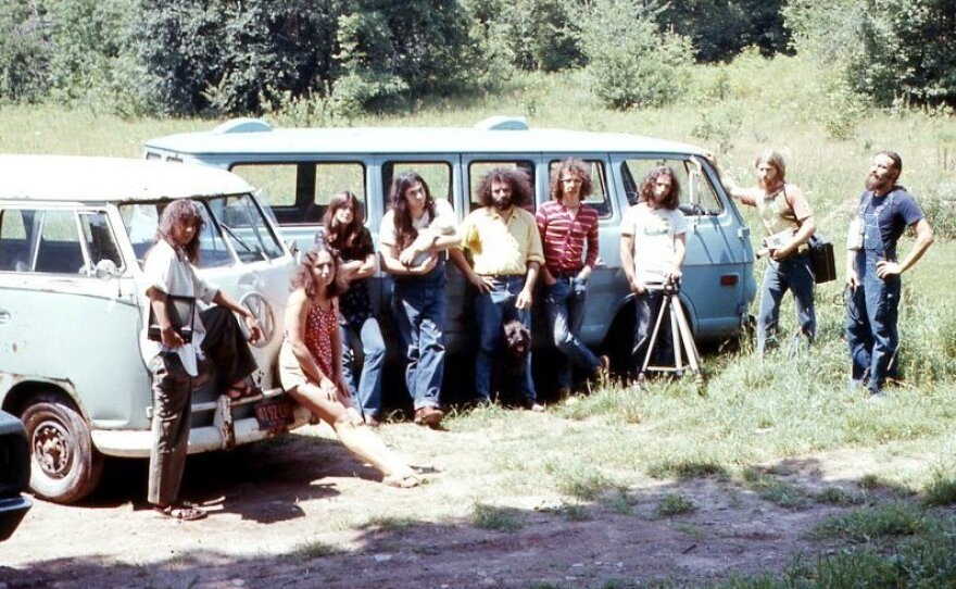 Videofreex including Parry Teasdale and David Cort, fourth and fifth from left, Bart Friedman, third from right, and Skip Blumberg, second from right, gathered in their Catskills town in 1973.
