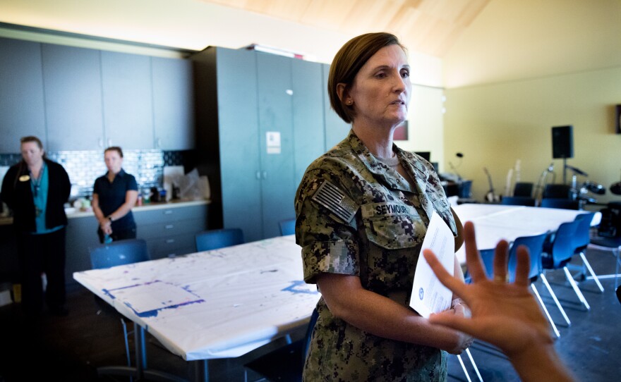Navy Capt. Mary Seymour, commanding officer at Naval Support Activity Bethesda, is interviewed about the closure of the bowling center, which has angered many veterans who used the alley for medical recreation therapy.