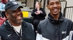 Jayland Walker (right) with his former wrestling coach Robert Hubbard in February 2020.