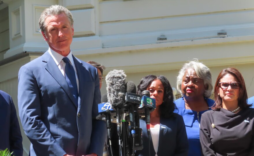 California Governor Gavin Newsom is joined by Democrats in the Texas state legislature Friday, July 25, 2025, outside the Governor's Mansion in Sacramento.
