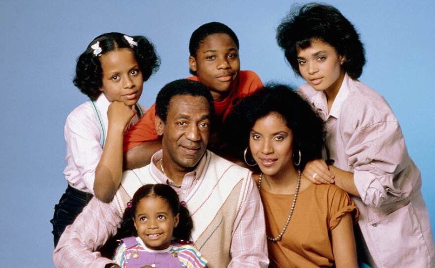 Bill Cosby, center, with the cast of his hit sitcom The Cosby Show; clockwise from top left, Tempestt Bledsoe, Malcolm-Jamal Warner, Lisa Bonet, Phylicia Rashad and Keshia Knight Pulliam.