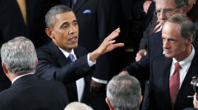 President Obama mingled with guests and lawmakers after his speech to a joint session of Congress on Thursday at the Capitol.
