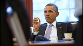 President Barack Obama discusses Ukraine during a meeting with members of his National Security Staff in the Oval Office, Feb. 28, 2014.