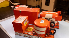 This photo provided by the NTSB on Tuesday, Sept. 8, 2026, shows the flight data recorder from from the Amazon cargo jet that barreled off a runway at Miami International Airport.