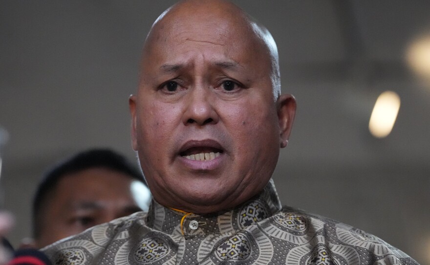 Philippine Sen. Ronald dela Rosa speaks to reporters at the Philippine Senate in Pasay, Philippines on Wednesday.