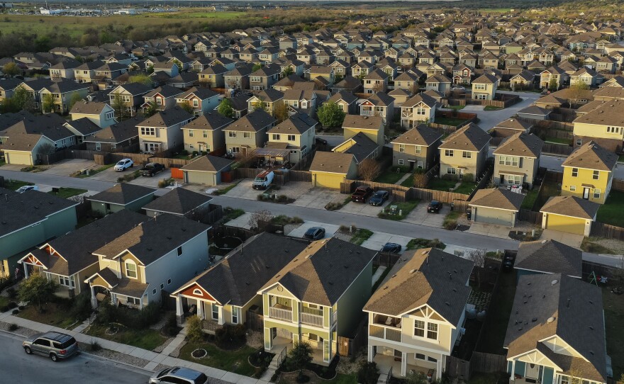 Some baby boomers find that when they want to downsize, there are no smaller options in their neighborhoods. Single-family homes are seen in a neighborhood in San Marcos, Texas, last month.