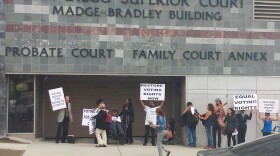 Disability rights advocates from Spectrum Group protest outside the San Diego Superior Court building on August 23, 2016. The group wants California judges to notify people with disabilities who have been disqualified from voting that they can regain their rights under a new law.