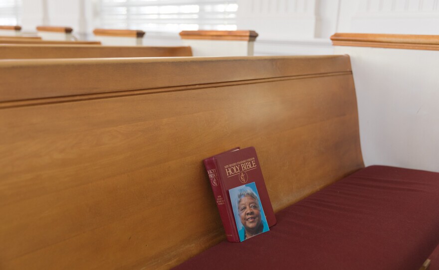 A photo of Mann sits on the pew where she sat most Sundays at Hoosier Memorial United Methodist Church.