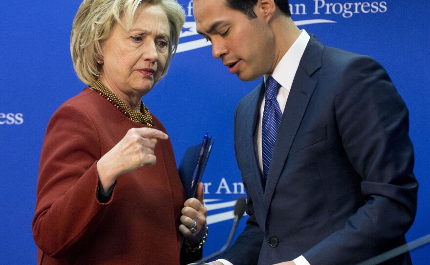 Hillary Clinton talks with Housing and Urban Development Secretary Julian Castro after both spoke at an event in March.