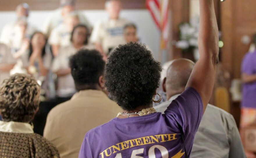 Congregants celebrate Juneteenth at Reedy Chapel African Methodist Episcopal Church in Galveston, Texas, on Sunday, June 19, 2016, following the annual march from the Old Galveston County Courthouse.