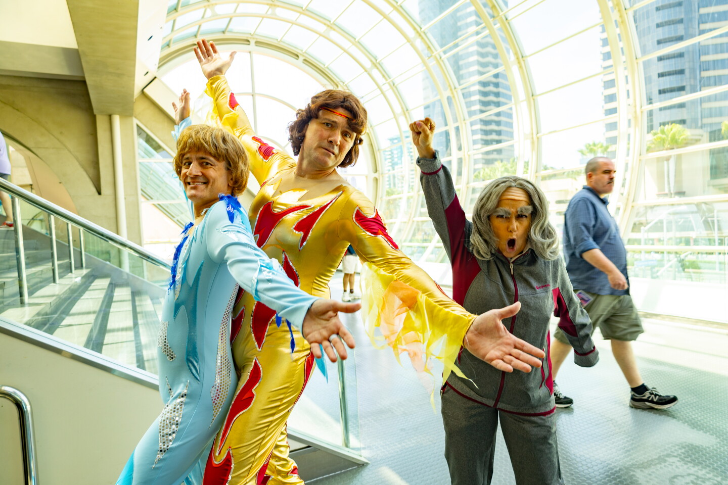 Cosplayers dressed as characters from "Blades of Glory" strike a pose at Comic-Con on July 26, 2026.